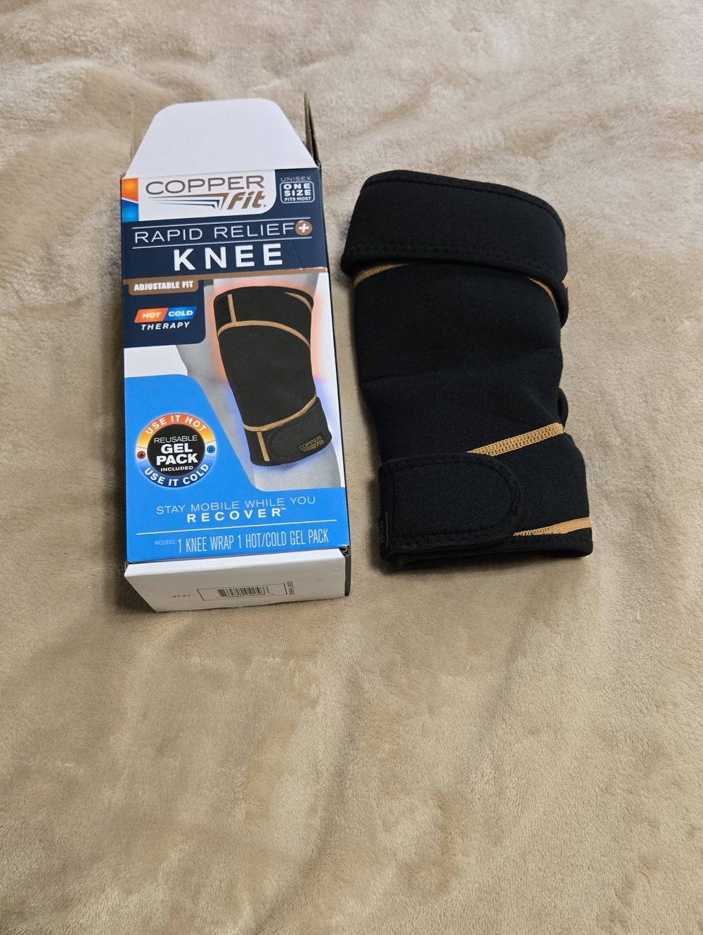 Copper Fit Rapid Relief Knee Brace in Black with Gold Trim